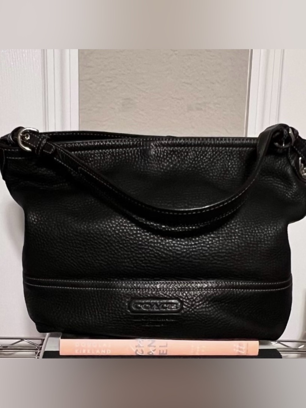 COACH leather shoulder bag with pebble texture finish.